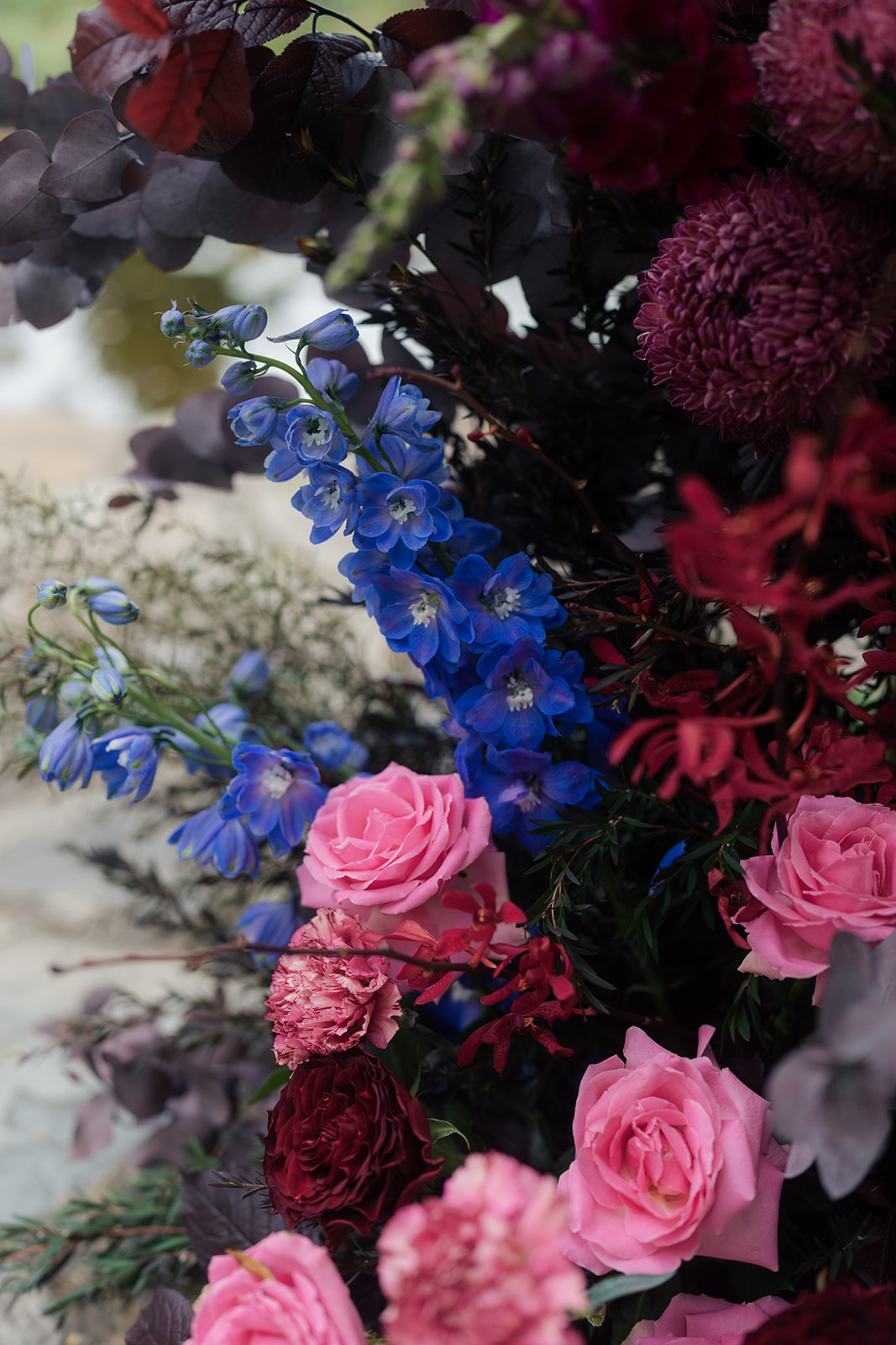 Etherial Botanica wedding florals in dark purple and pink tones to suit the couples moody rustic elegance brief