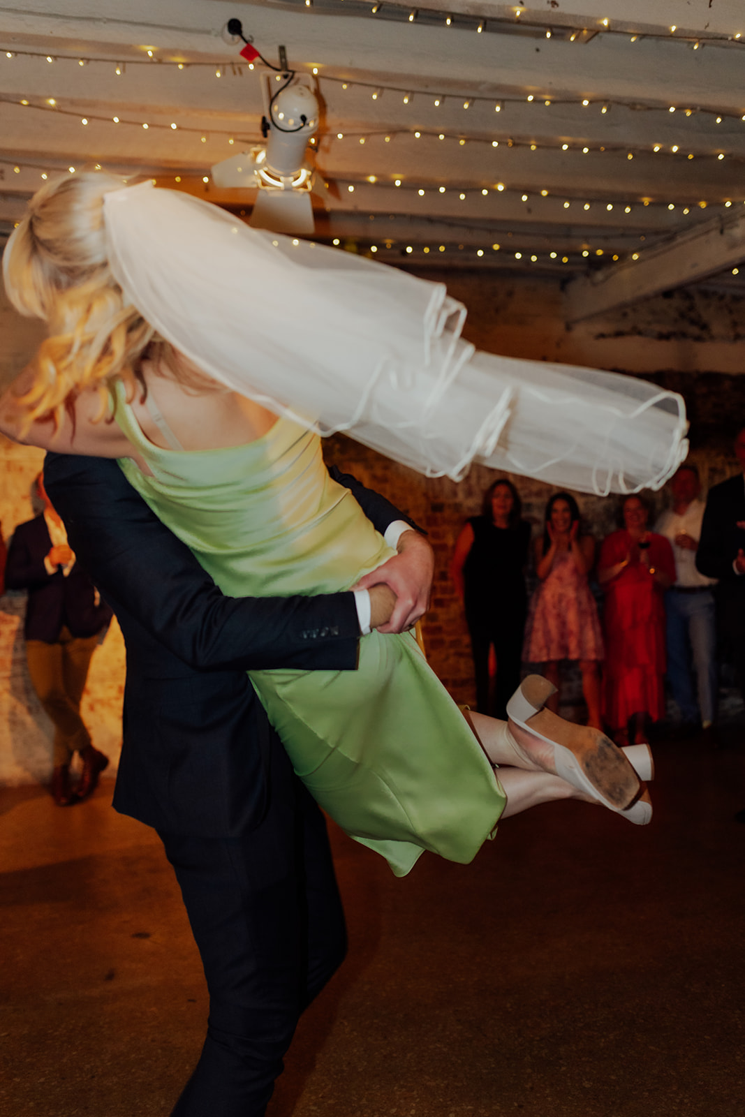 Bride and groom dancing at Intimate wedding infused with fun and colour