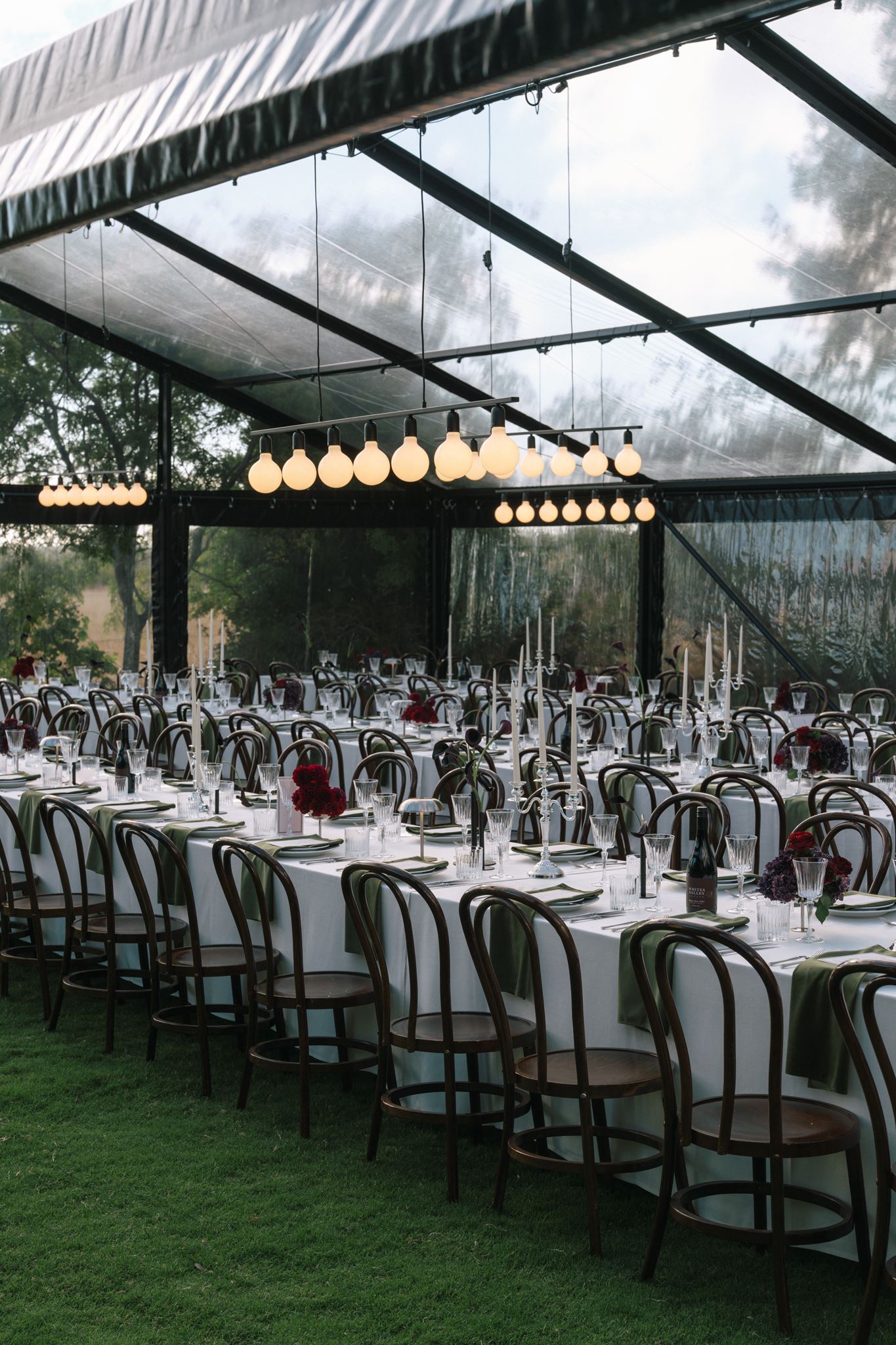 Wedding reception long tables in clear roof marquee at Whites Valley Estate, South Australia