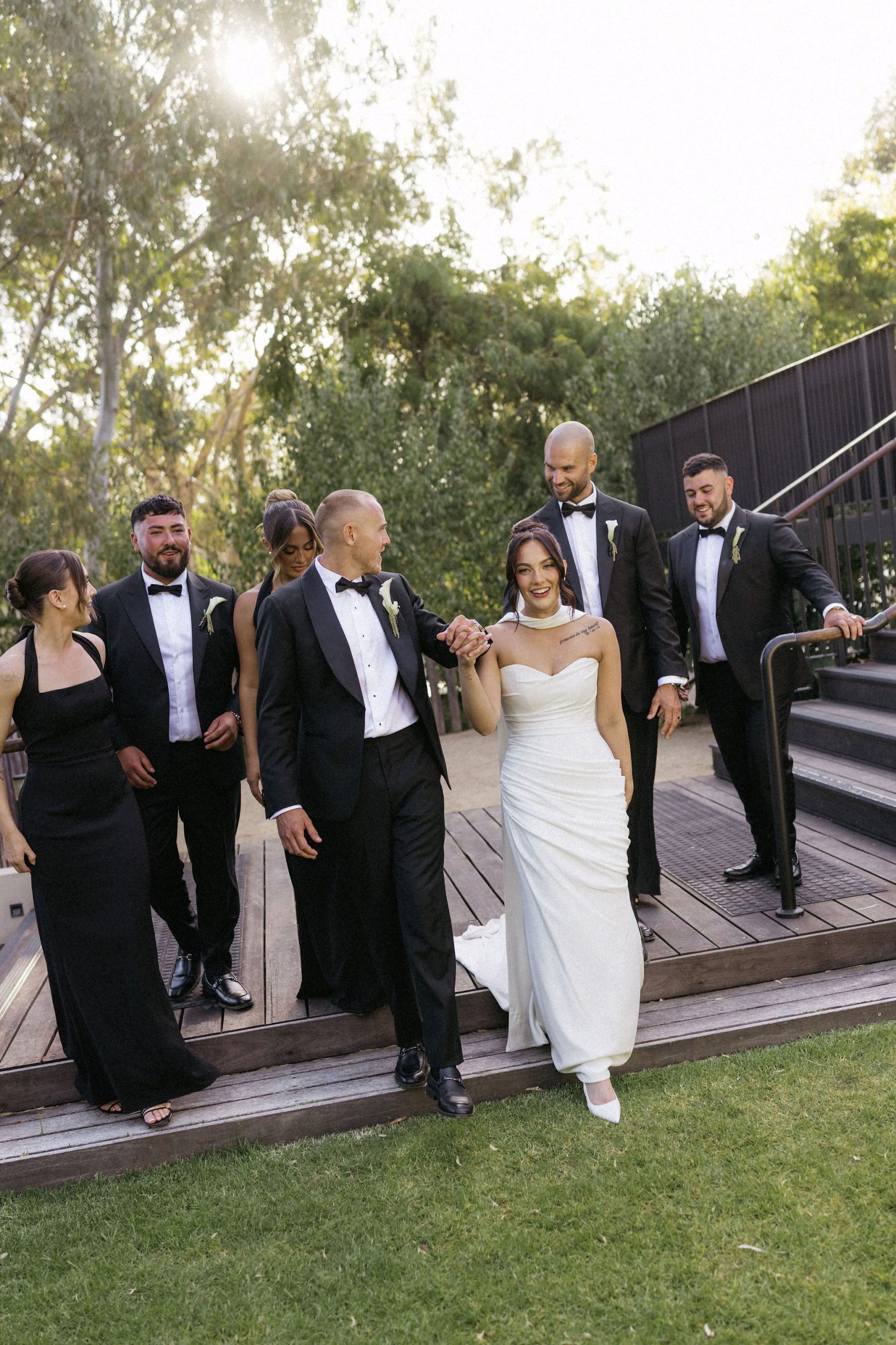 Wedding party walking into House on Haines