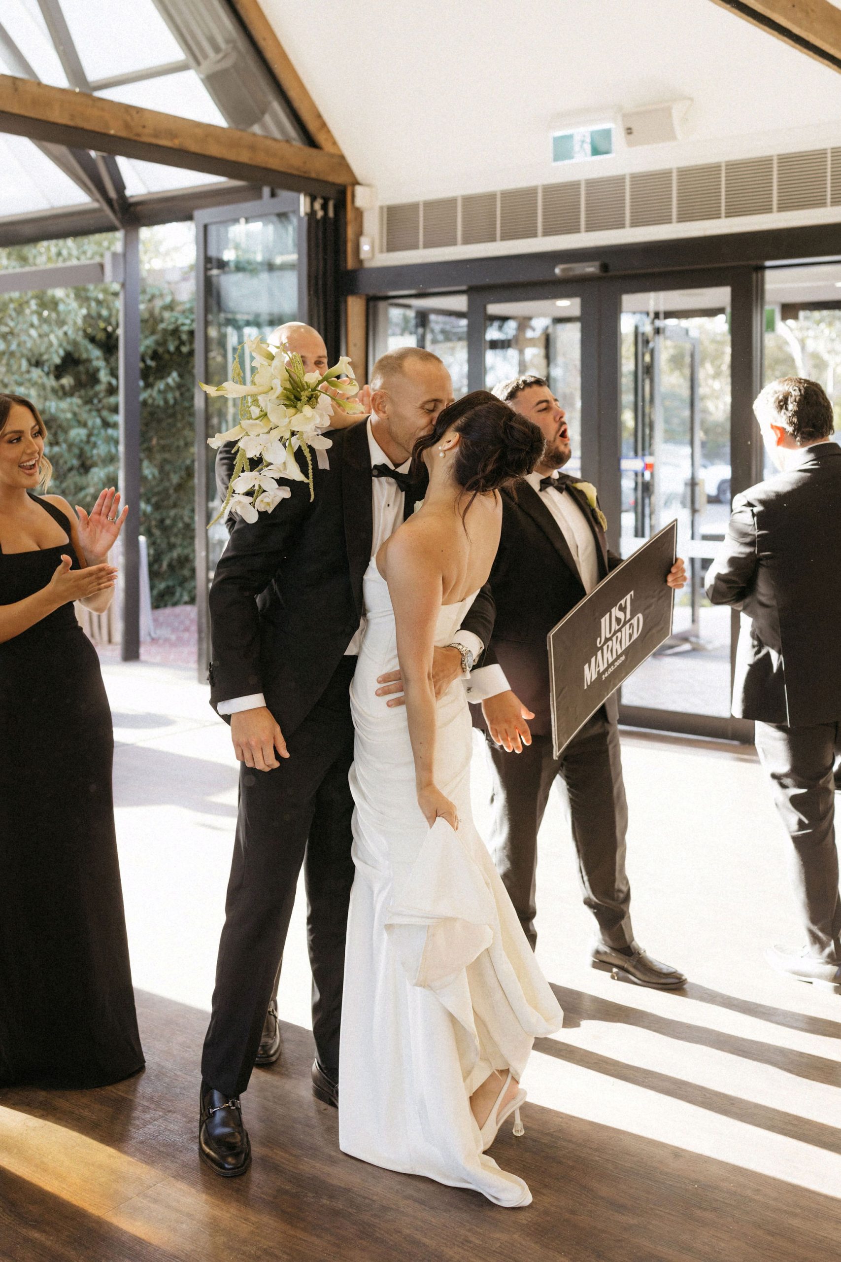 Bride and groom kissing at entrance to House on Haines, Tea Tree Gully