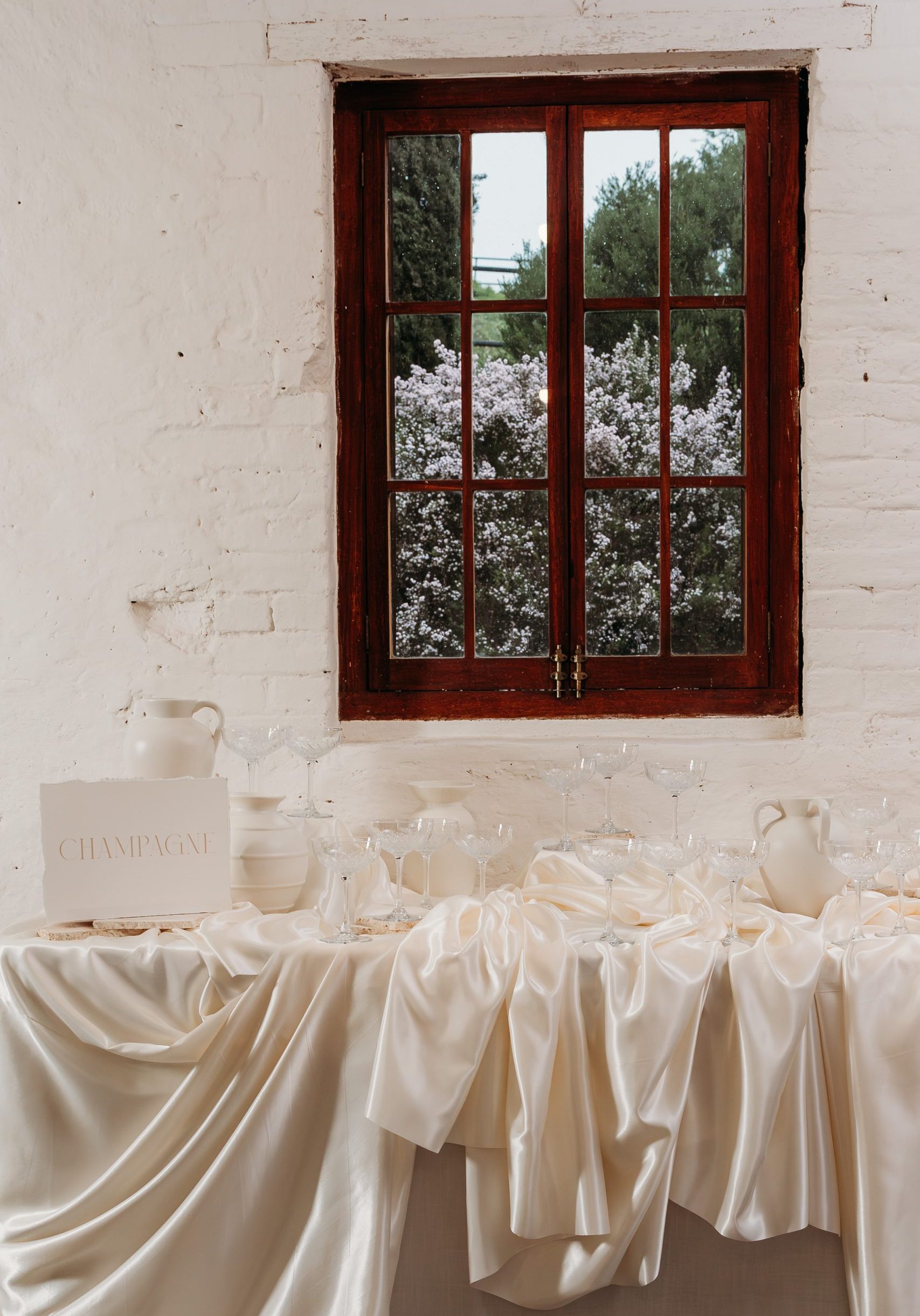 Champagne coloured champagne glass table at Marybank Estate Wedding Venue